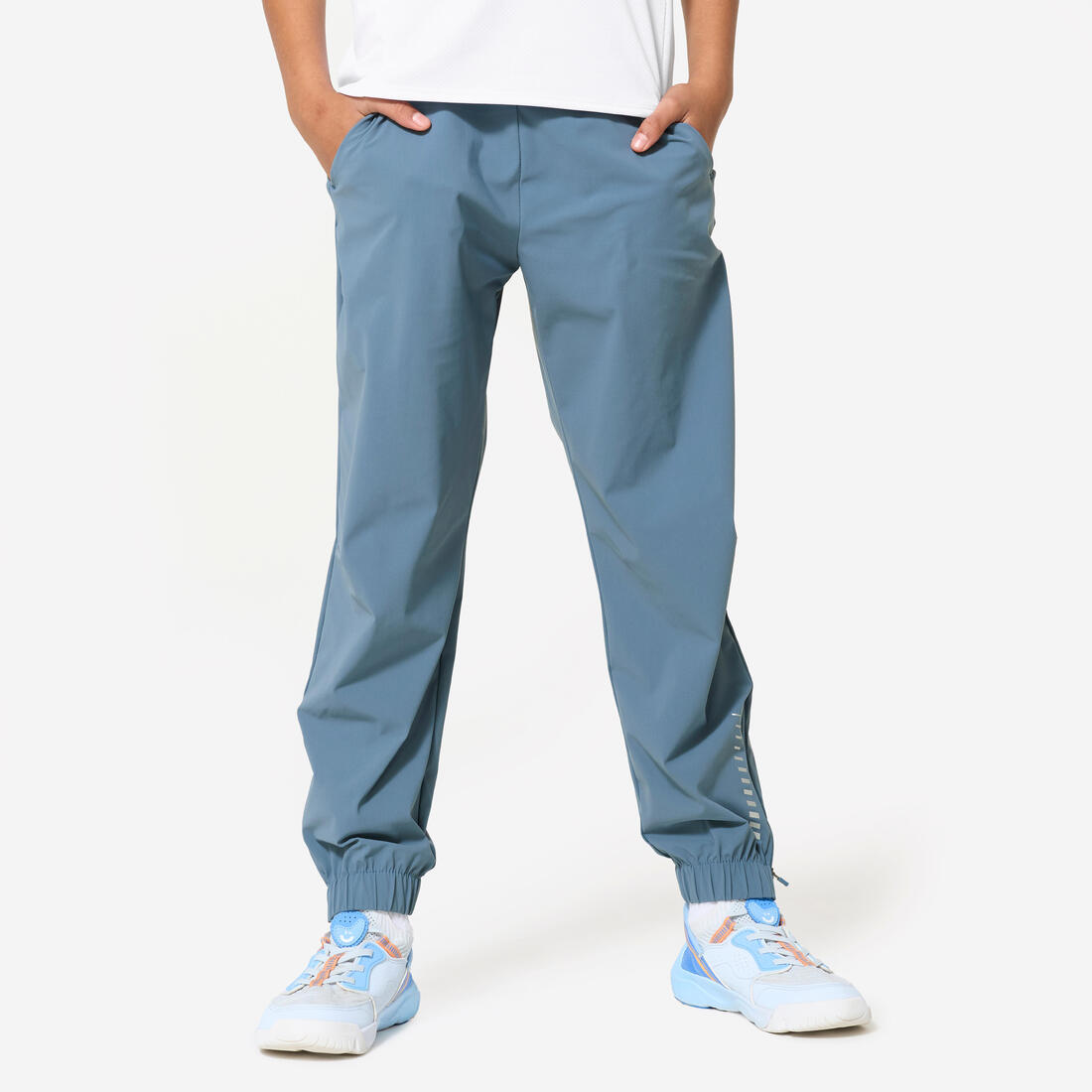 article en promo : Pantalon multisports respirant et anti-uv garçon, bleu