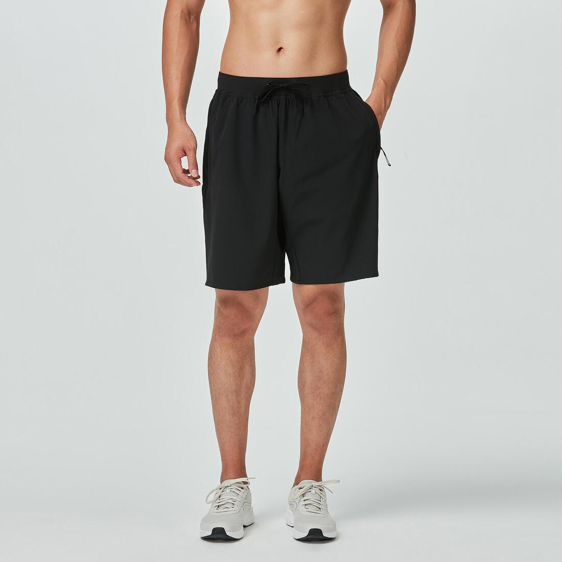 article en promo : Short de fitness collection respirant poches zippées homme